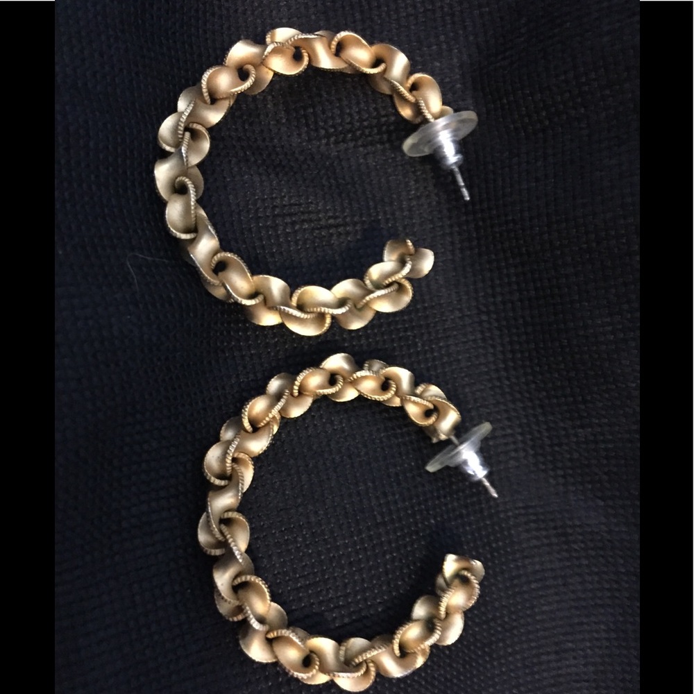 Gold tone knotted hoops